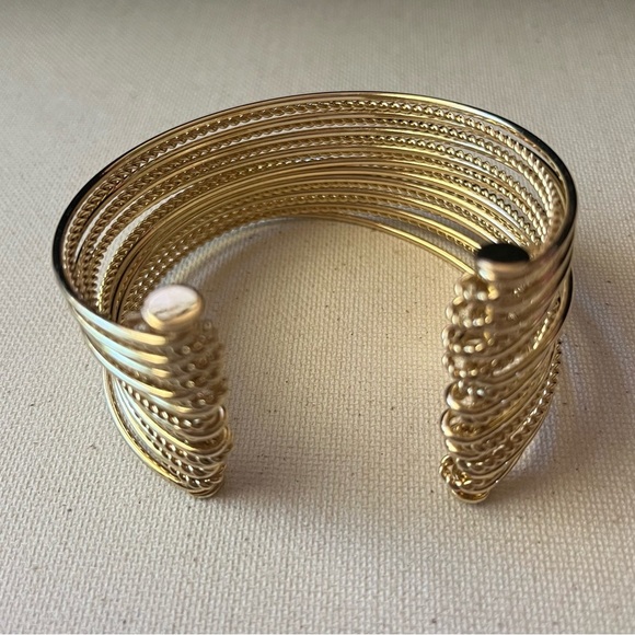 Elegant Gold Tone Cuff Bracelet - Picture 2 of 4